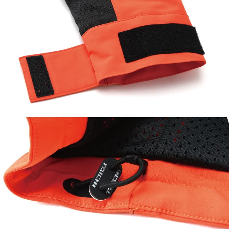 Hệ thống dây rút ở eo và Velcro ở tay áo giúp hạn chế gió khi di chuyển tốc độ cao